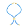 Sky blue braided rope bracelet featuring a gold circular tree motif charm and metal tips - Bracelet: 22