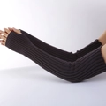 Detail of dark grey ribbed knit arm warmers with thumb holes and soft elastic fabric - Dark Gray