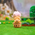 Close-up of cute resin orange bear ornament with pink lotus and IM FINE RELAX text - A187 Open Minded