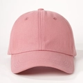 Front view of a pink cotton baseball cap with a curved brim and a six-panel crown design - One Size / Deep Pink