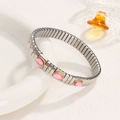 Stretch stainless steel bracelet with three pink gemstones and silver-gold finish - Pink Round Gemstone Style (16)