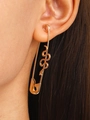 Golden safety pin earring featuring a delicate snake relief on a model's earlobe - KC Gold Single Snake Pin Earring (7632)