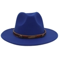 Detailed macro view of the royal blue wool felt fedora hat with golden feather buckle detail - Sapphire Blue