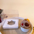 Scented cupcake candle with brown cream and butterfly pretzel in a clear gift box - 1 Piece Cookie Style