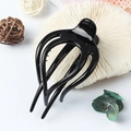Minimalist black glossy hair claw clip in a unique three-prong creative design - Glossy Black