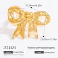 Anillo de lazo dorado en acero inoxidable para mujer, medidas 30,39 mm y 19,83 mm - Estilo Lazo a Rayas (JZ21424)