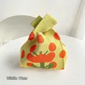 Borsa da polso in maglia verde chiaro con fiori arancioni e larghezza di 19 cm - Fiore Giallo Chiaro