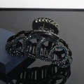 Classic black hair claw clip featuring dark blue and clear rhinestones in a circular design - Blue White Rhinestone