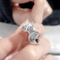Macro shot of silver bow ring with sparkling zircon stones and detailed metal craftsmanship - Silver Large Solitaire Bowknot