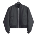 Classic black bomber jacket with ribbed cuffs and metallic zipper on a white background - XS / Black