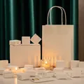 Scented candle gift set in elegant cream packaging with matching festive carry bag - Happy Goddess Day Hidden Poetry 12pcs Gift Box