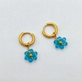 Handmade gold hoop earrings with light blue crystal flower charms for women - Transparent Blue