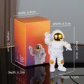 White astronaut figurine with gold visor and orange packaging box detail - Small Gold-edged Model A (Color Box)