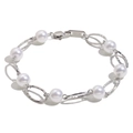 Elegant 18K gold plated stainless steel bracelet with white pearls on a white background - Imitation Pearl Bracelet - Silver