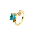 Verstellbarer vergoldeter Ring mit herzförmigem blauem Zirkonia und Nordstern-Design - Gold mit blauem Zirkon