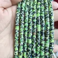 Macro shot of 3x6mm green mottled natural stone spacer beads for DIY jewelry making - Imperial Jasper 9