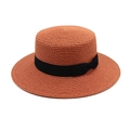 Detailed close-up of orange-red boater hat featuring a stylish black grosgrain ribbon bow - M (56-58cm) / Caramel color