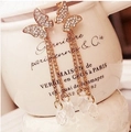 Elegant gold butterfly tassel earrings with white rhinestones and crystal drop pendants - Butterfly Long Tassel Style (E642 Butterfly) / Gold