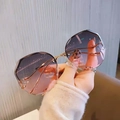 Lunettes de soleil sans monture oversize avec verres dégradés bleu-orange et monture dorée - Vieux rose
