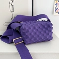 Detail of purple popcorn knit crossbody bag with gold metal buckle and pleated texture - Purple