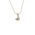 Close-up of golden butterfly pendant necklace with sparkling crystal inlay on snake chain - Gold Brilliant Zirconia Butterfly