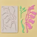 Macro view of bellflower silicone mold with detailed pink flower and green leaf outputs - Lily of the Valley Shape (L)
