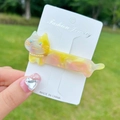 Cute resin cat hair clip with pink marble pattern, pearls, and sparkling rhinestones - Colorful Yellow Cat