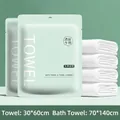 Disposable travel towel and bath towel set in portable pouch with waffle texture - Green Towel And Bath Towel Set
