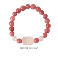 Close-up of strawberry crystal beaded bracelet with rectangular jade charm on white background - Colored Jade Stone Pendant Style (WB335)