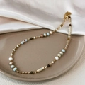 Bohemian Baroque pearl necklace with turquoise beads and gold accents on satin - Regular Colorful Beaded Necklace