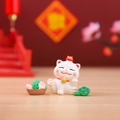 Lucky cat ornament with white finish and wealth symbols in a festive setting - Constant Luck Cat (1081-18)