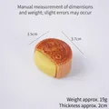 PVC Mondkuchen-Modell in Orange mit Mid-Autumn-Schriftzug und Füllungsdetails - Vanillefüllung (Wort: Mid-Autumn)