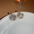 Macro detail of vintage gold and silver coin earrings with green stone and relief - Gold Silver Two-tone Coin Portrait Green Gem Style (34#)