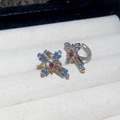 Detail of cross hoop earrings with multicolored pavé zircon stones in a silver setting - Multi-color Cross Hoop Earrings (1 Pair) / Colorful