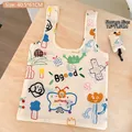 Foldable cartoon dog eco-friendly shopping bag shown with 40.5x61cm dimensions - Graffiti Illustration