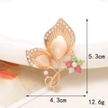 Detailed view of colorful rhinestone leaf brooch with dimensions 5.3cm and 4.3cm - D920 Morning Glory
