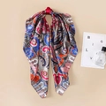 Detailed view of bohemian paisley print silk scarf used as a stylish handbag accessory - 90x90cm / Rose Red (D9047)
