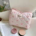 Pink checkered quilted makeup bag with zipper closure and fabric label for storage - Clutch Bag / Pink