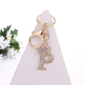 Golden crystal letter P keychain with crown detail and sparkling rhinestones for bags - Letter P / Gold