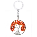 Handmade tree of life keychain featuring natural orange crystal stones and metal wire wrap - Red Agate Round Scattered