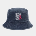 Close-up of pink ribbon embroidery and Never Give Up text on washed blue denim bucket hat - M (56-58cm) / Navy Blue