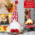 Gnomo de Navidad LED con gorro rojo de copos sobre base de madera, altura 30 cm - Gnomo sin rostro Estilo A