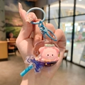 Lollipop shaped pig keychain with blue handle and matte metal clasp in pink and blue - Klein Blue - Cartoon Rabbit