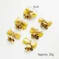 6pcs set of 5cm gold Christmas bell ornaments with glitter bows and frosted leaves - Gold Gold Leaf / Set of 6