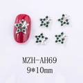 Détail de bijoux d'ongles en forme d'étoile avec strass verts pour Noël 9x10mm - Double Étoile (AH69)