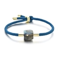 Bracelet tressé bleu ajustable avec perles en métal doré et une pierre naturelle de labradorite - Pierre Grise / Corde Bleue