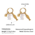 Detail showing gold stainless steel hoop earrings with coral and fish charms with turquoise - Fish Coral and White Stone Style (YYE025331)