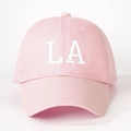 Detail of pink cotton baseball cap with white LA embroidery and curved brim - One Size / Pink