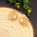 Floral champagne amber earrings with center pearl on a rustic wood background - Citrine/Amber Petal Studs (Champagne)