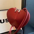 Chic red heart shaped leather crossbody bag with V-shaped stitching and silver zipper - Burgundy